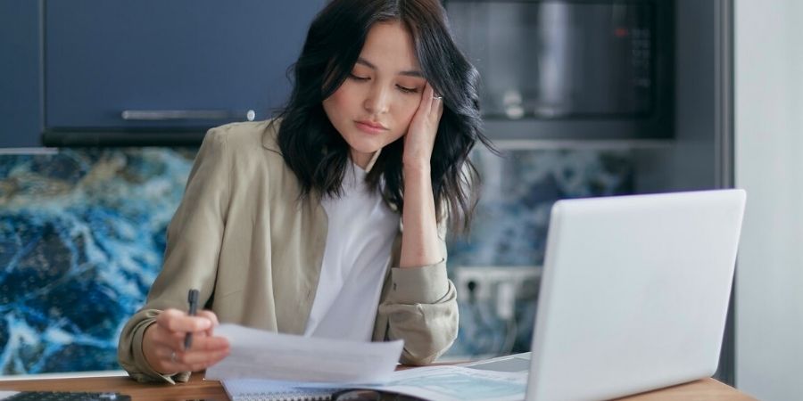 Hiring professional reviewing resumes