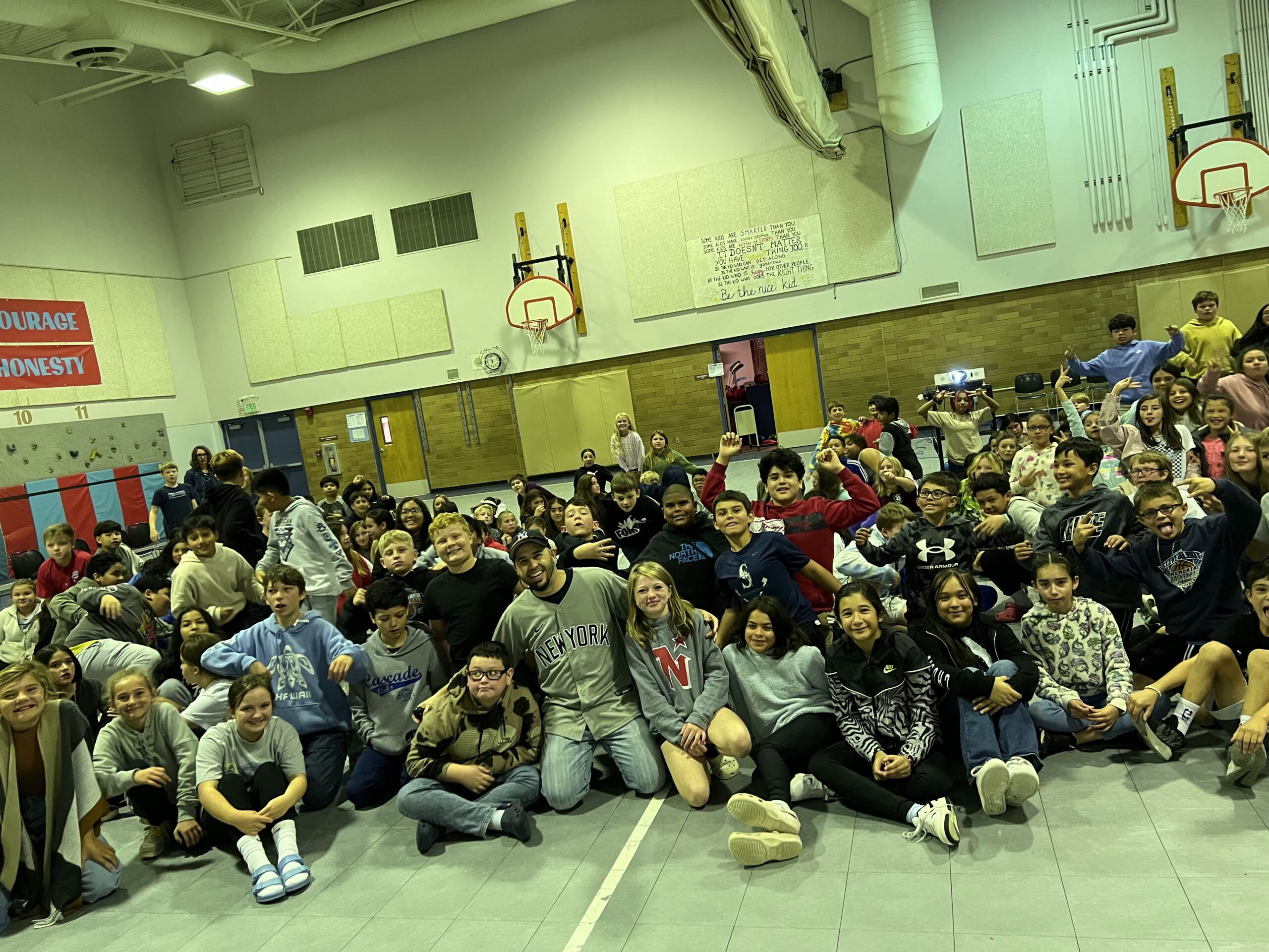 Motivational Youth Speaker Eddie Cortes with students at the school assembly program at Cascade Elementary School