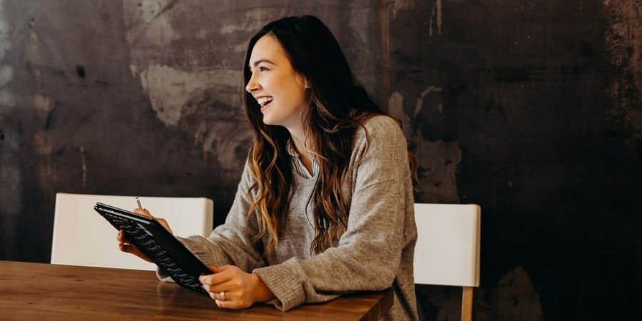 Woman having fun while at work